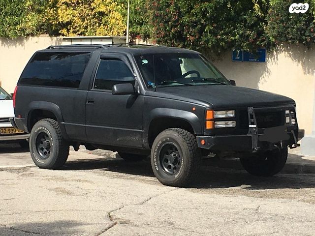 מודעת רכב ג'י.אם.סי יוקון