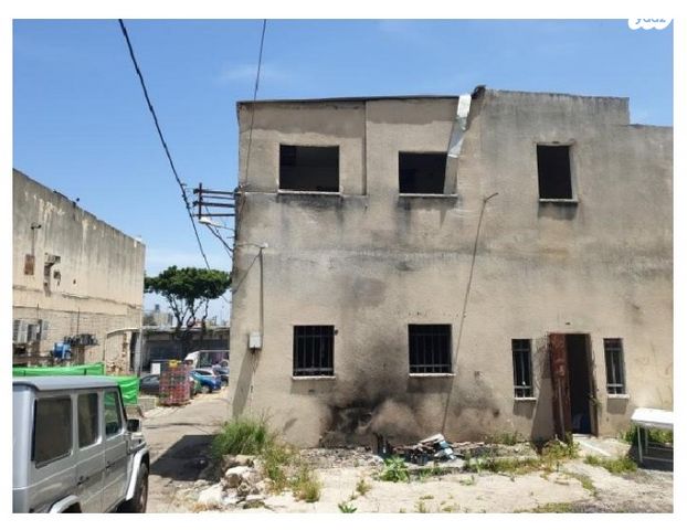 בניין מגורים, קיבוץ גלויות, העיר התחתית, ואדי סאליב, חיפה