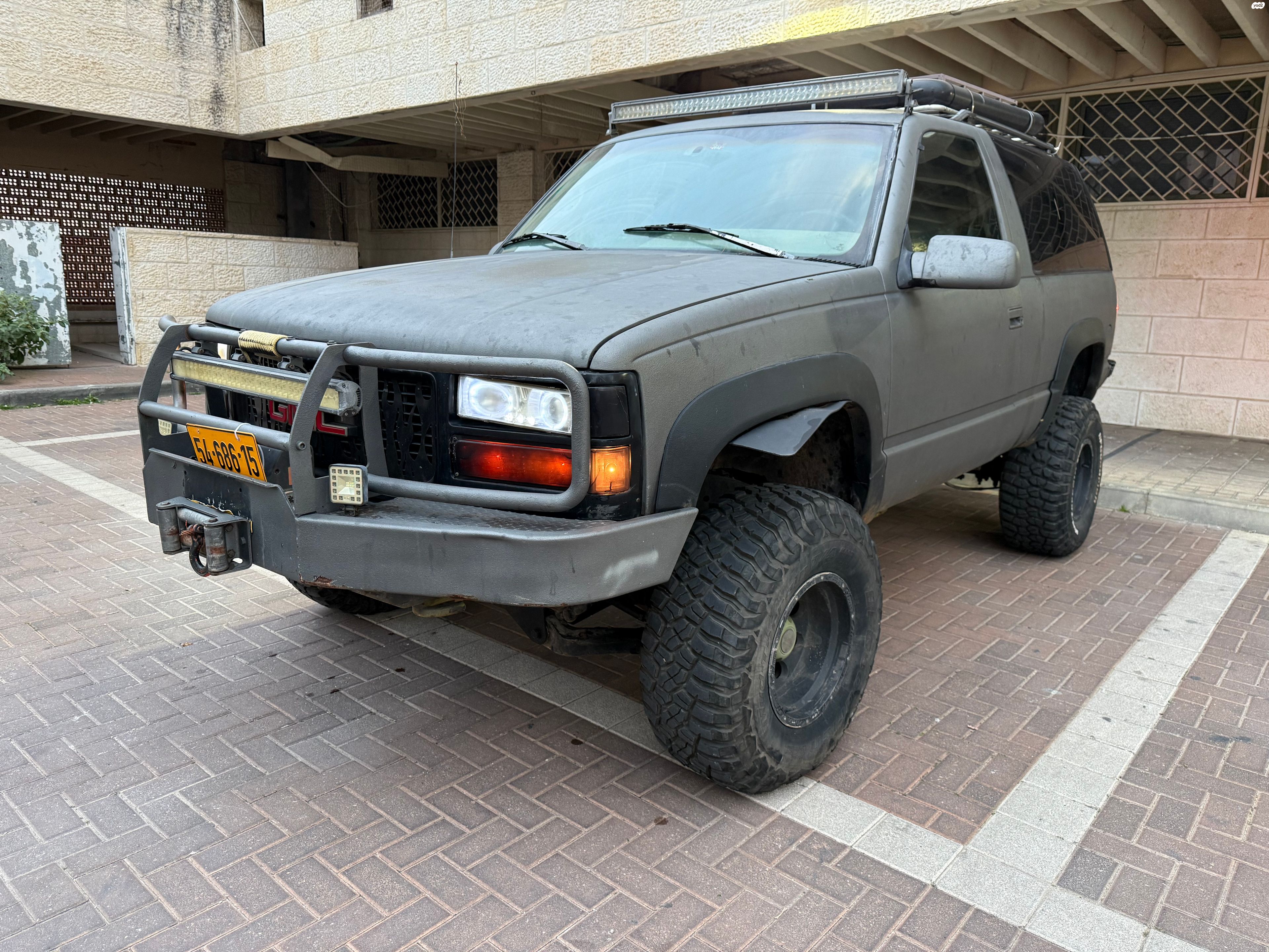מודעת רכב ג'י.אם.סי יוקון