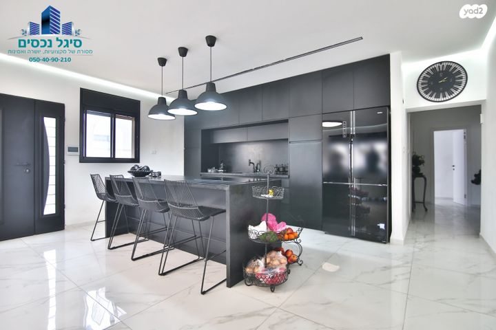 דו משפחתי, קרית אתא