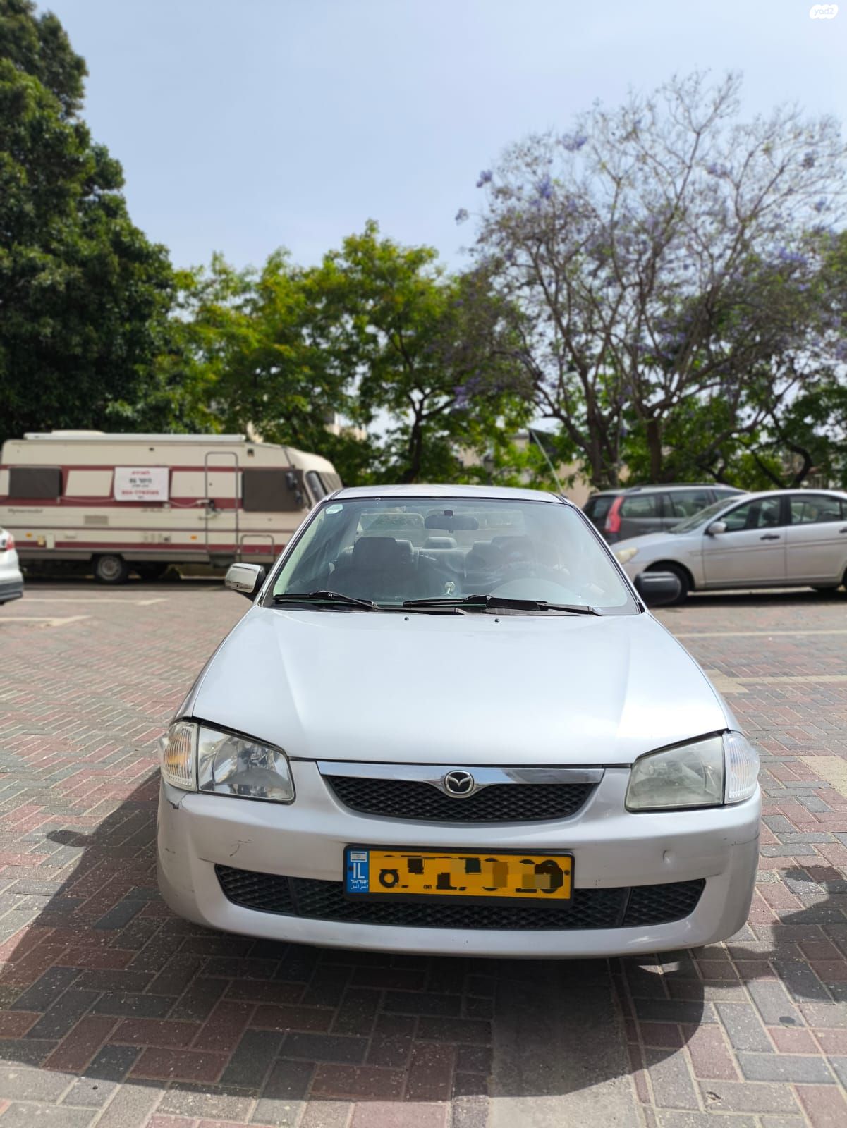 מודעת רכב מאזדה 323