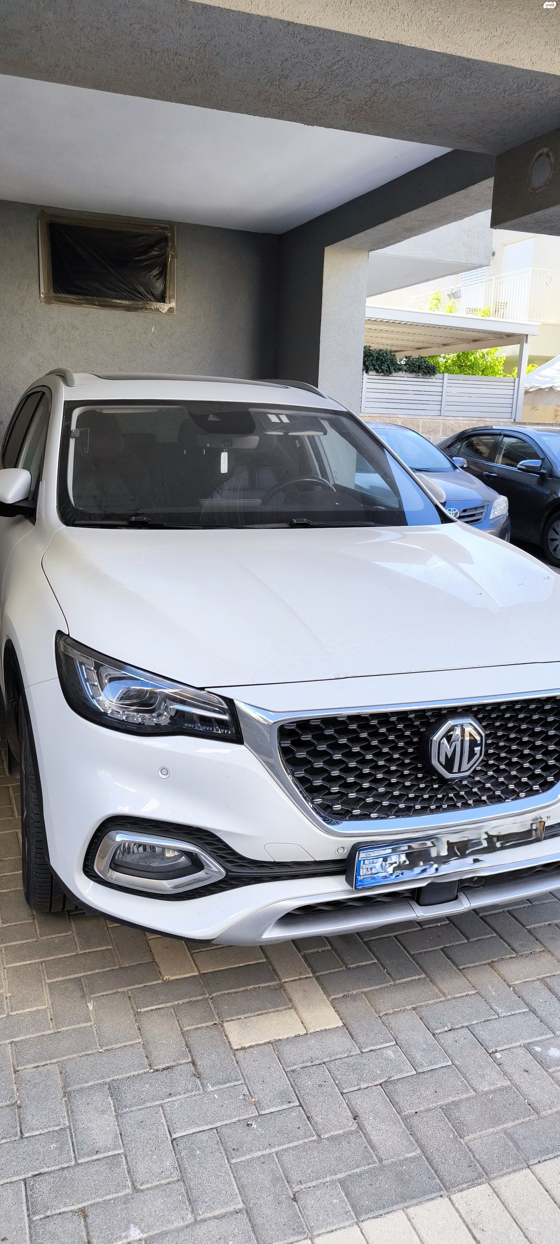 מודעת רכב אם ג'י EHS PHEV