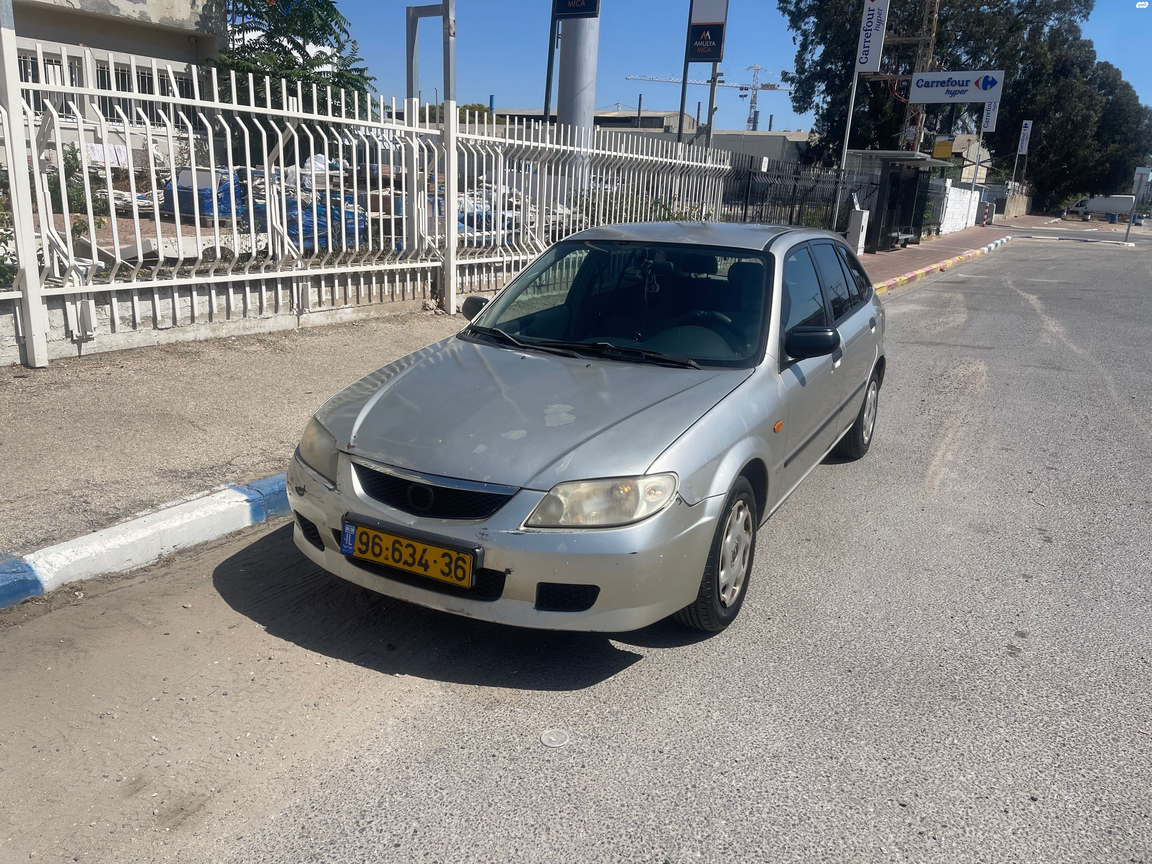 מודעת רכב מאזדה 323