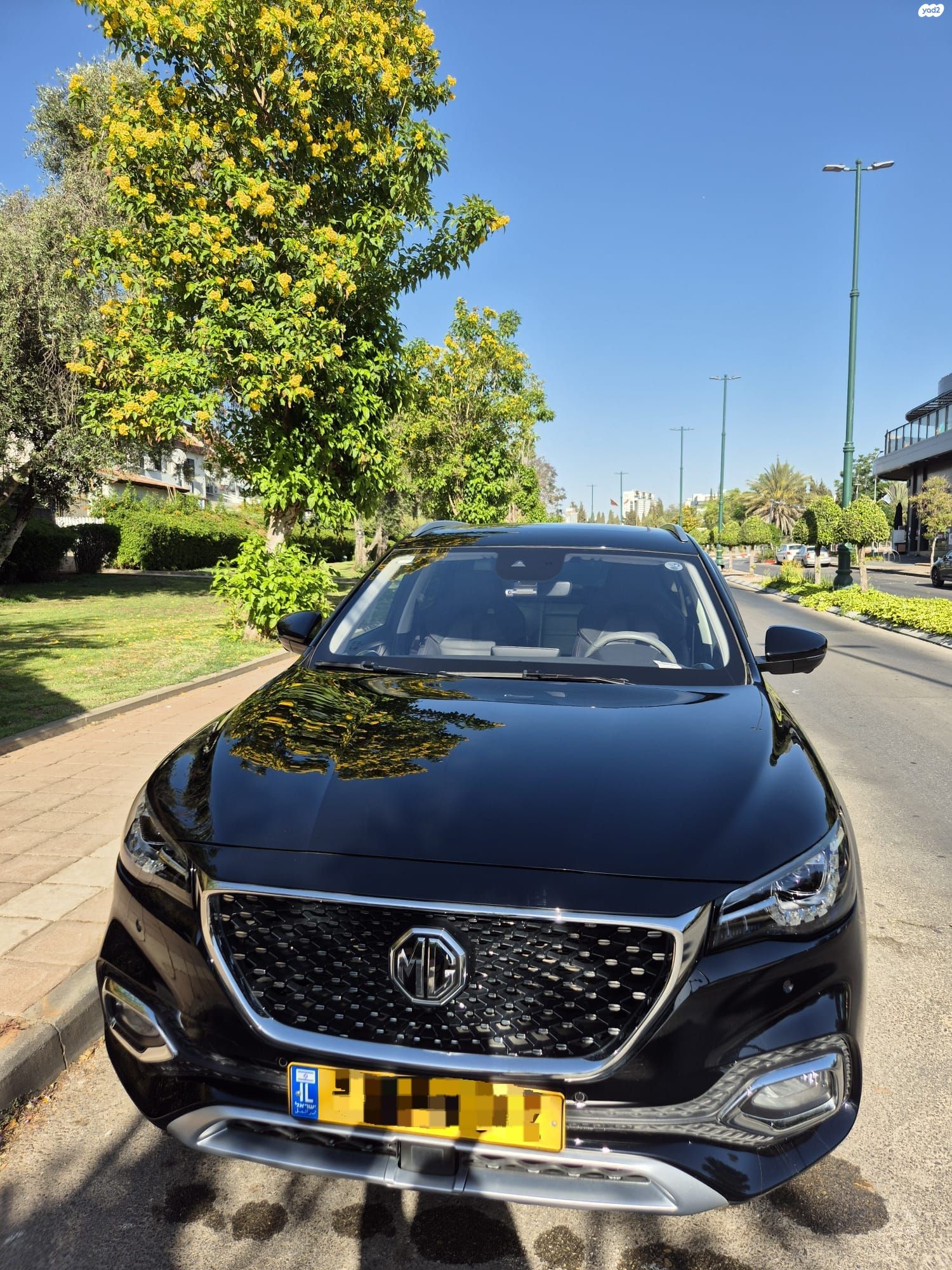 מודעת רכב אם ג'י EHS PHEV