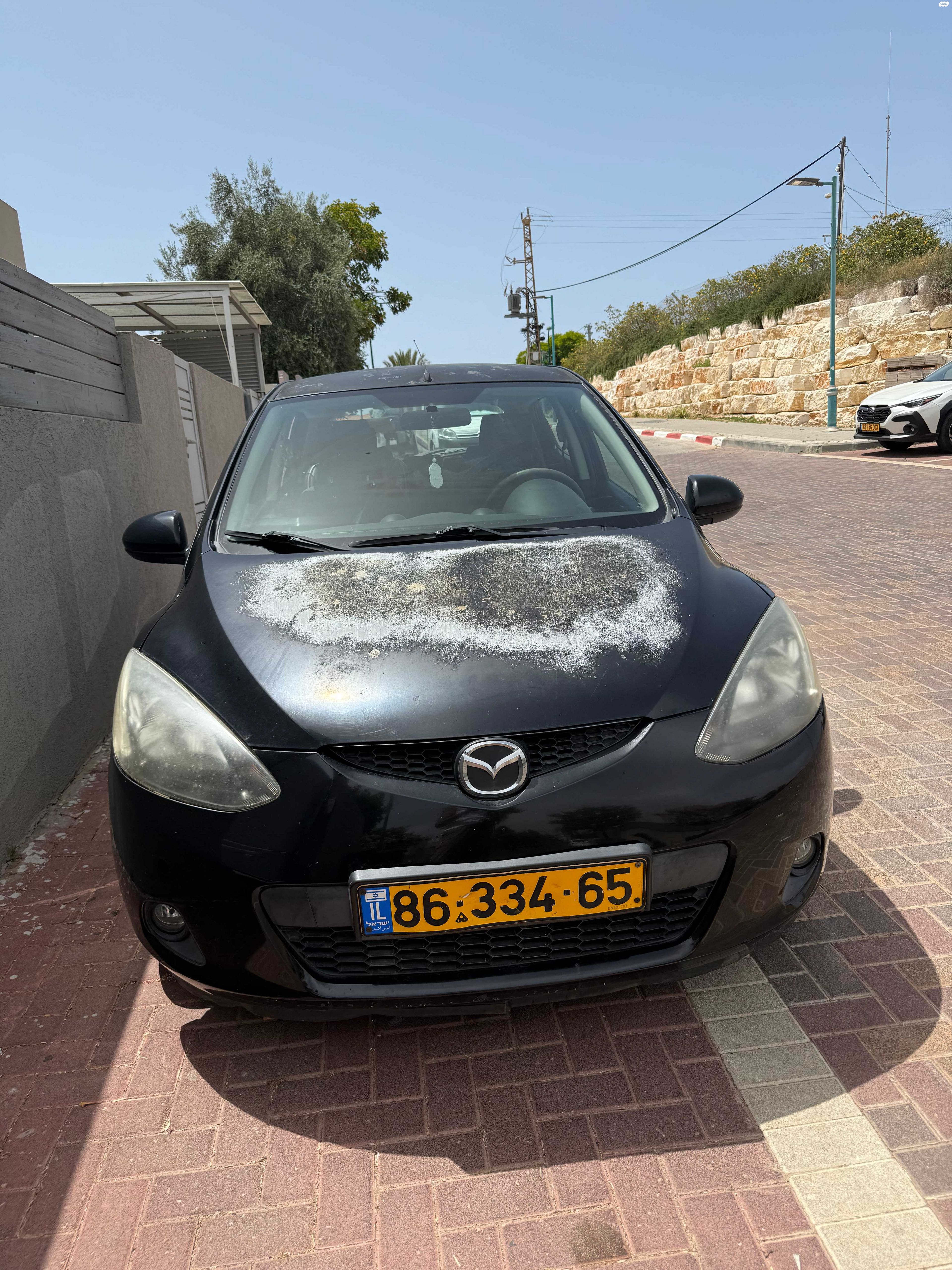 מודעת רכב מאזדה 2