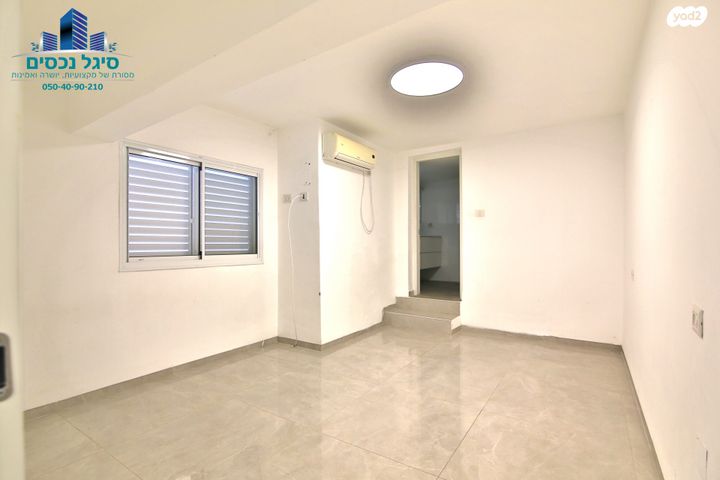 דו משפחתי, קרית אתא