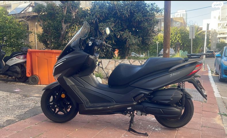 מודעת רכב קימקו איקס-טאון 125I