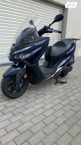 מודעת רכב קימקו איקס-טאון 125I