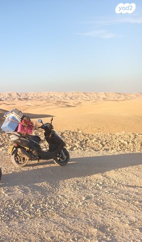 מודעת רכב קוואנג-יאנג Movie 125 XL