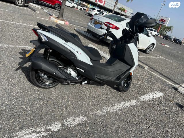 מודעת רכב סאן יאנג ג'וי-מקס Z-300