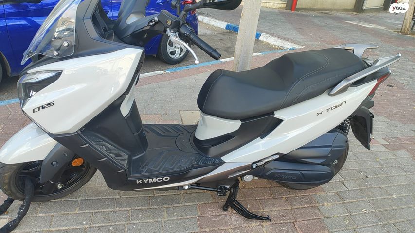 מודעת רכב קימקו איקס-טאון 125I