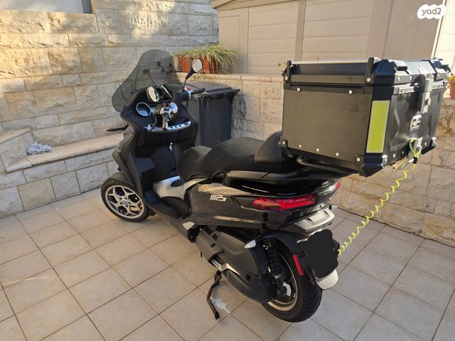 מודעת רכב פיאג'ו MP3 400