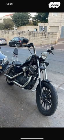 מודעת רכב הרלי דיווידסון איירון 883