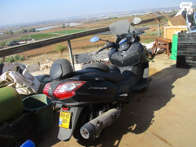 סאן יאנג מקסים 400i