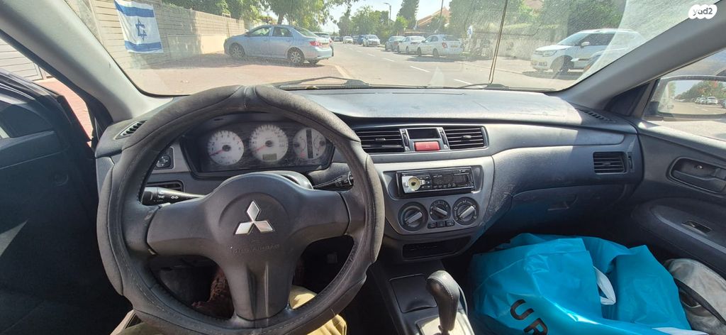 מודעת רכב מיצובישי לנסר