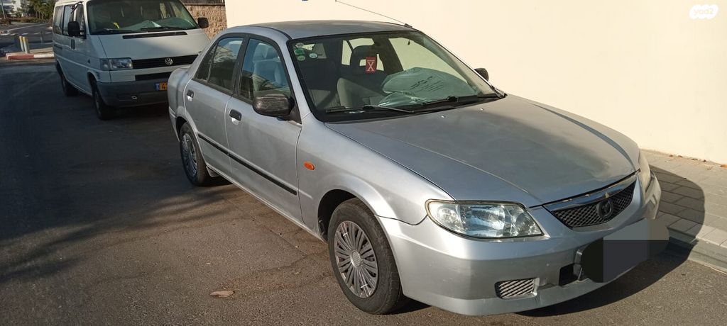 מודעת רכב מאזדה 323