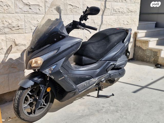 מודעת רכב קימקו איקס-טאון 125I