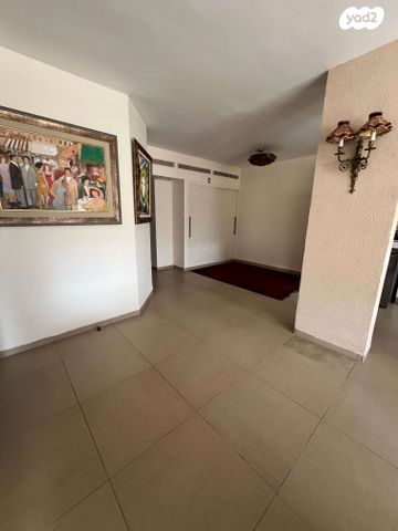 דירת גן, ד"ר יואכים כספרי, נעמ"ת, חיפה