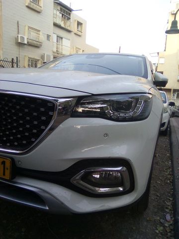 מודעת רכב אם ג'י EHS PHEV