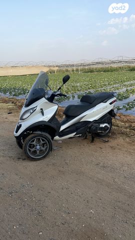 מודעת רכב פיאג'ו MP3 500