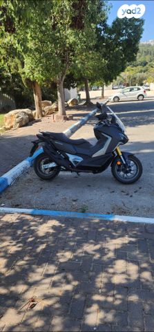 מודעת רכב סאן יאנג ADX400