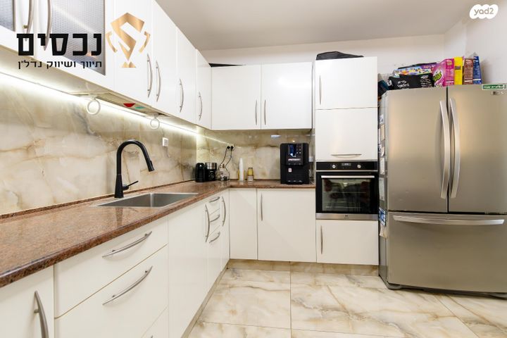 דירת גן, רב ניסים גאון, אלעד