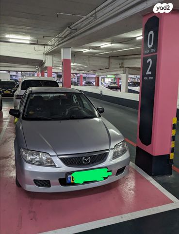 מודעת רכב מאזדה 323