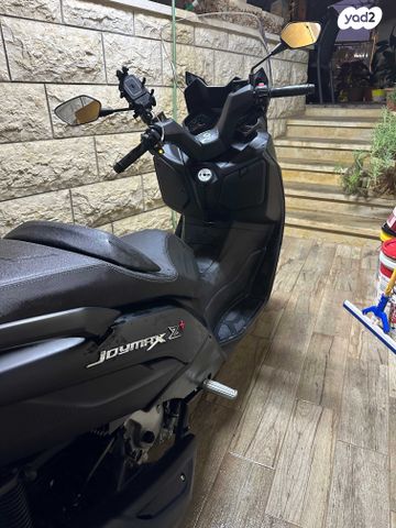 מודעת רכב סאן יאנג ג'וי-מקס Z-300