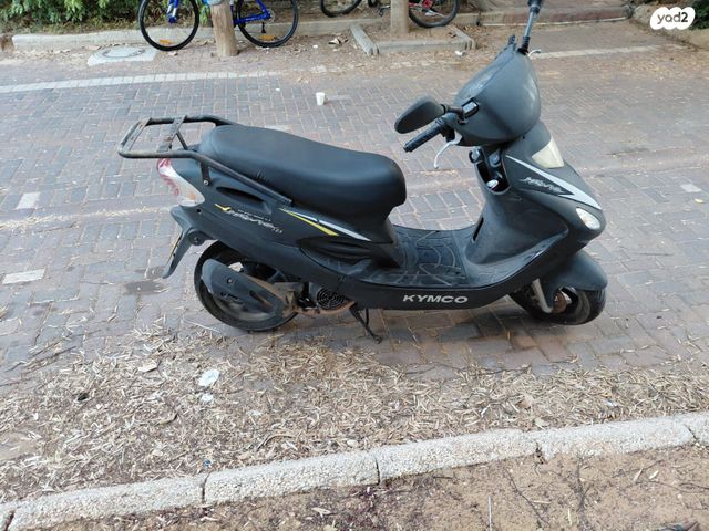 מודעת רכב קוואנג-יאנג Movie 125 XL