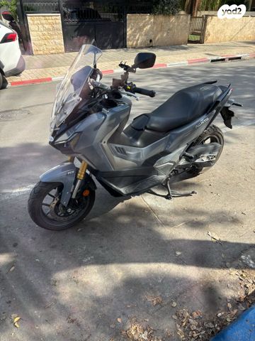 מודעת רכב סאן יאנג ADX400