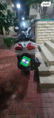 סאן יאנג מקסים 400i