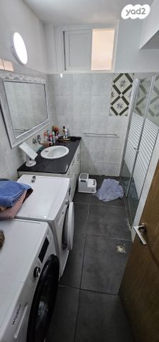 דירה, הרימון, מנחם בגין, עכו