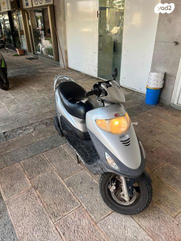 מודעת רכב קוואנג-יאנג Movie 125 XL