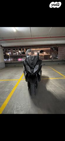 מודעת רכב קימקו דאון-טאון 350