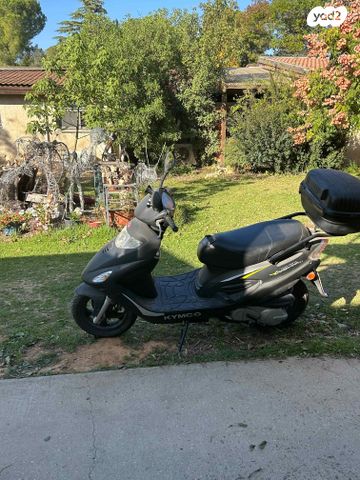 מודעת רכב קוואנג-יאנג Movie 125 XL