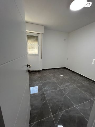 דירה, תשי"ג, מגדל העמק