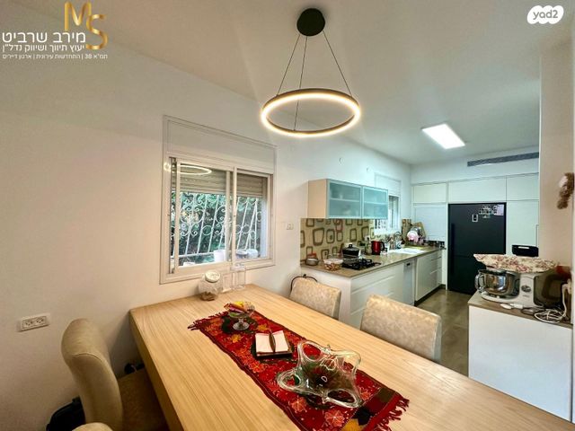 דירה, ד"ר יואכים כספרי, נעמ"ת, חיפה