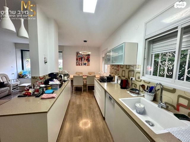 דירה, ד"ר יואכים כספרי, נעמ"ת, חיפה