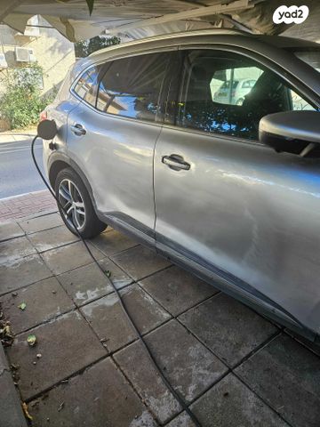 מודעת רכב אם ג'י EHS PHEV