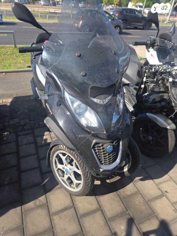 מודעת רכב פיאג'ו MP3 500