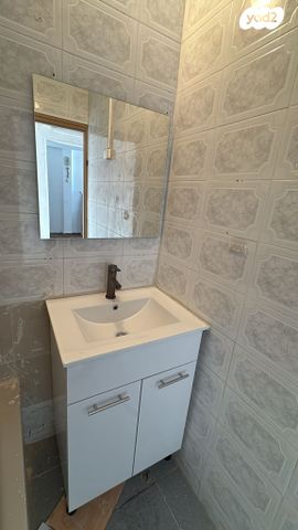 דירה, אלי כהן, קרית ים