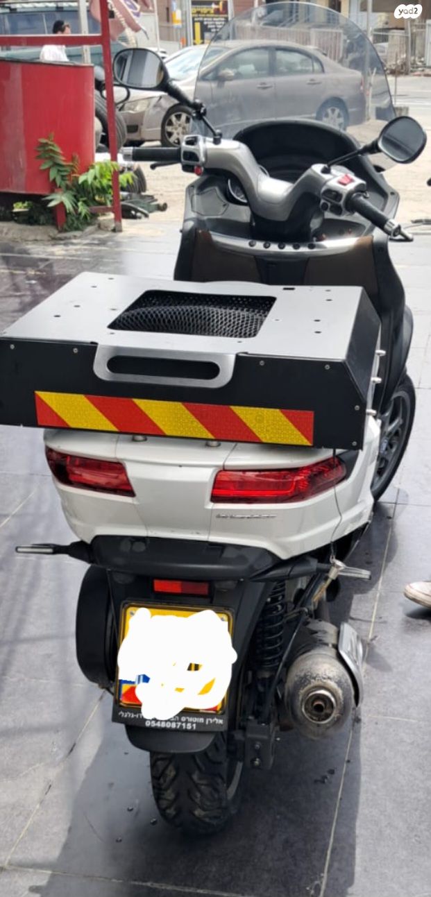 מודעת רכב פיאג'ו MP3 300