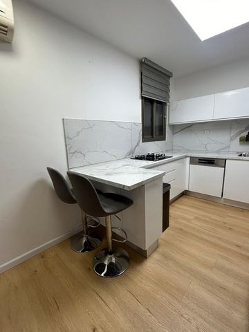 דירת גן, שדרות מנחם בגין 27, נווה דקלים, אשקלון