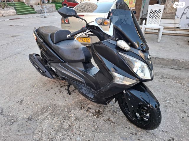 סאן יאנג ג'וי-מקס 300 XI