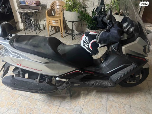 מודעת רכב קימקו דאון-טאון 350