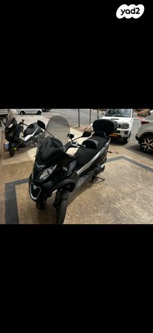 מודעת רכב פיאג'ו MP3 500