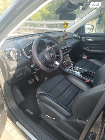 מודעת רכב אם ג'י EHS PHEV