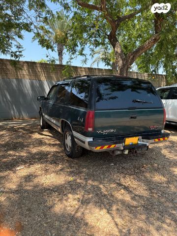 מודעת רכב ג'י.אם.סי יוקון