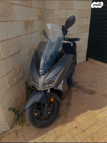 מודעת רכב קימקו איקס-טאון 125I