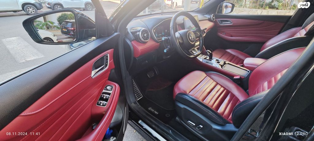 מודעת רכב אם ג'י EHS PHEV